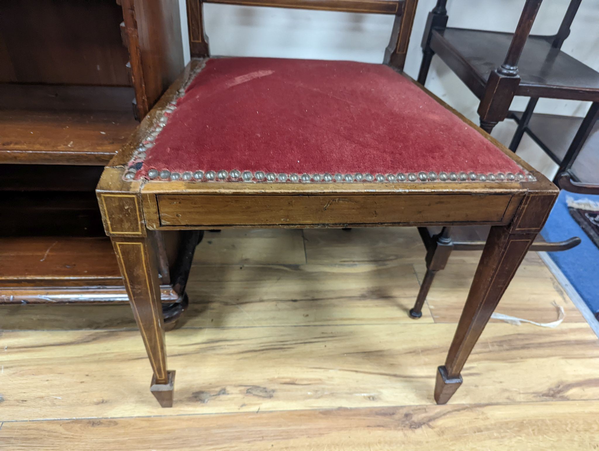 A pair of Edwardian inlaid mahogany lyre back chairs